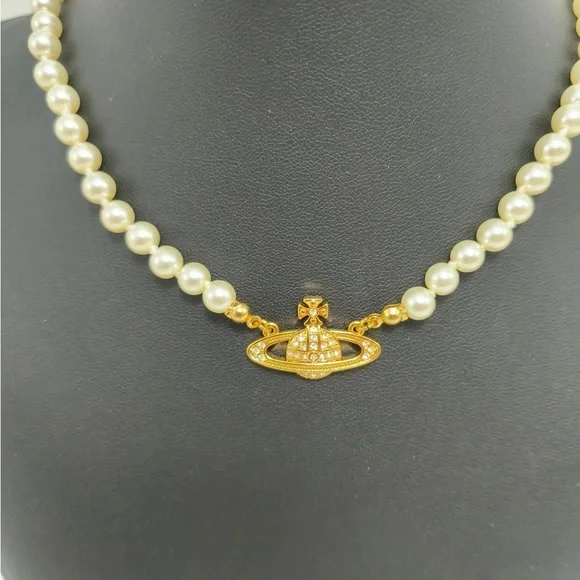 Vivienne Westwood Pearl Necklace with Gold Mini Saturn Pendant